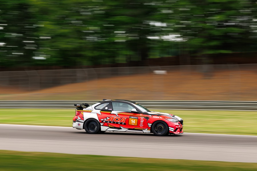 Ren's BMW M2 at speed, panning shot
